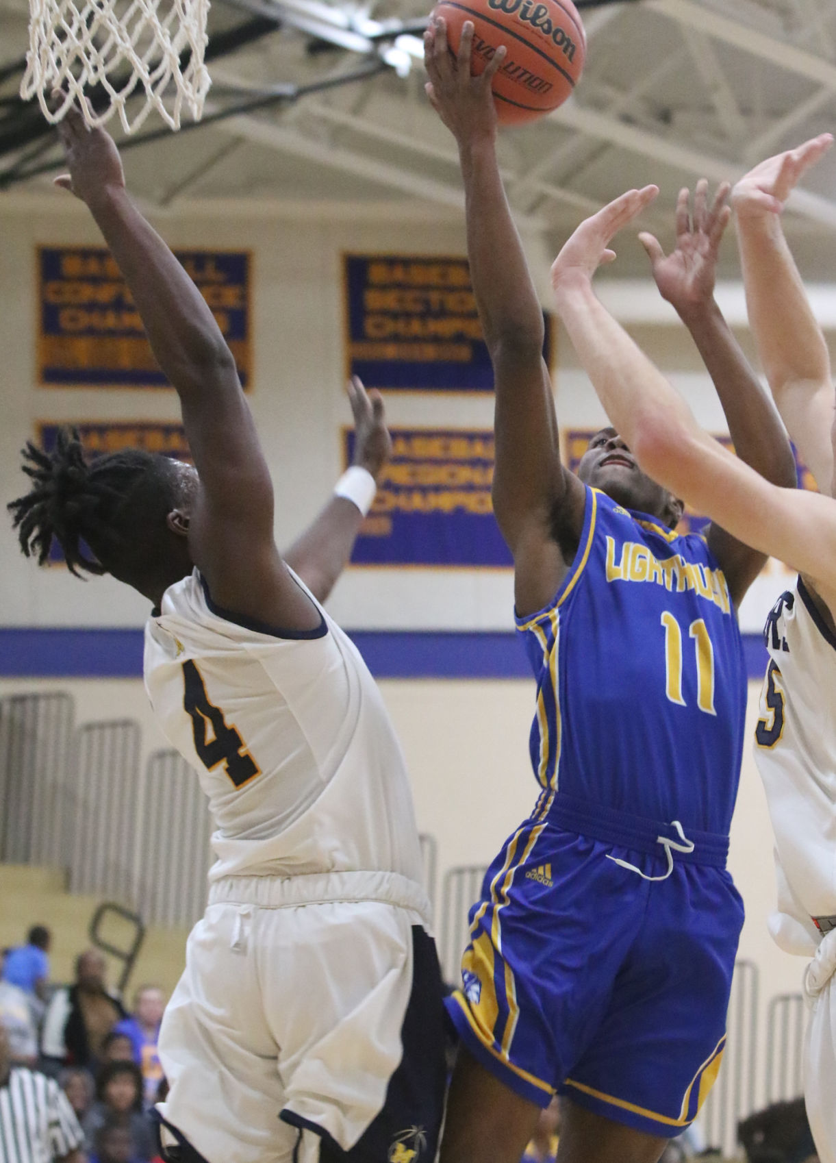 Lighthouse at Marquette Catholic boys basketball